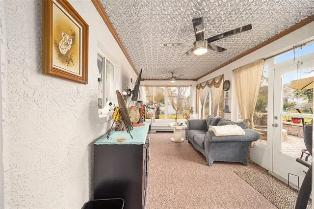 an aerial view of a house with a swimming pool