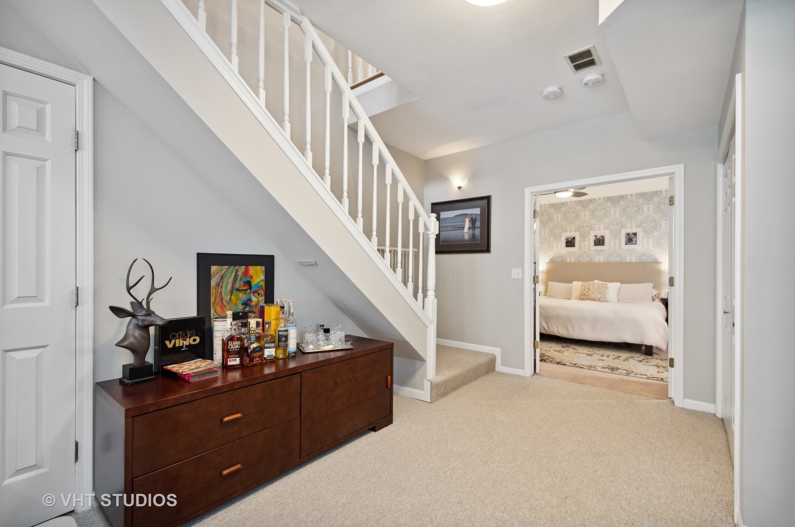 3124 North Seminary Avenue, Unit 1 Chicago, IL 60657 - Photo 11 of 25 a bedroom with furniture and a wooden floor