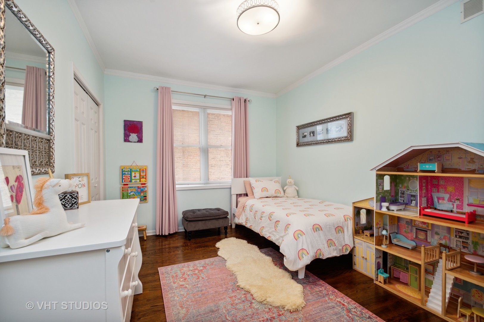3124 North Seminary Avenue, Unit 1 Chicago, IL 60657 - Photo 17 of 25 a bedroom with bed and a book shelf
