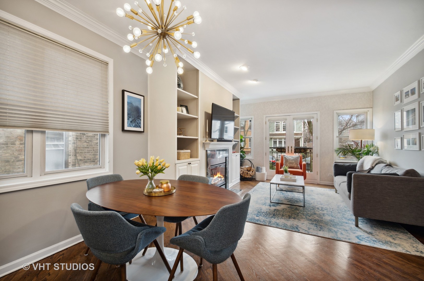 3124 North Seminary Avenue, Unit 1 Chicago, IL 60657 - Photo 4 of 25 a view of a dining room with furniture and wooden floor