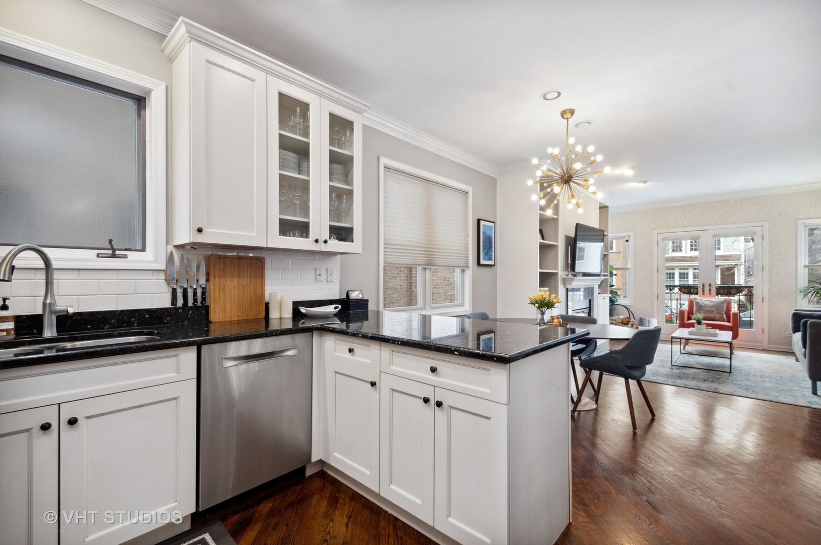 3124 North Seminary Avenue, Unit 1 Chicago, IL 60657 - Photo 8 of 25 a kitchen with granite countertop lots of counter space sink and cabinets