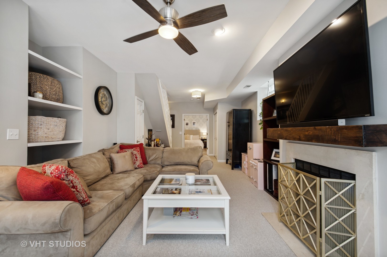3124 North Seminary Avenue, Unit 1 Chicago, IL 60657 - Photo 10 of 25 a living room with furniture a flat screen tv and kitchen view