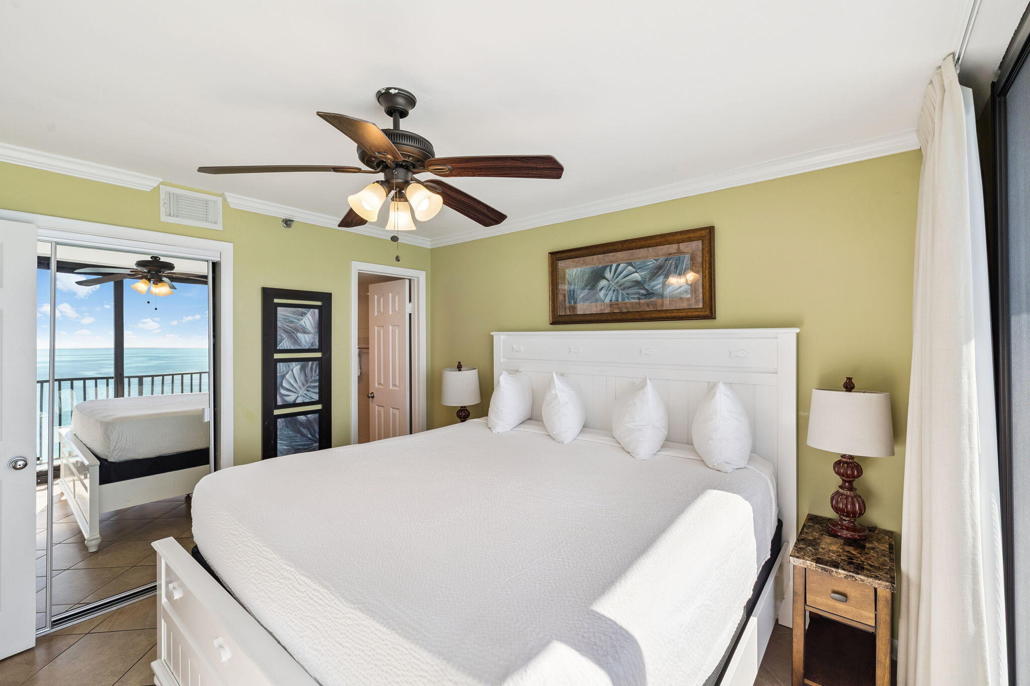 4100 East County Highway 30A, Unit 1606 Santa Rosa Beach, FL 32459 - Photo 20 of 34 a bed room with a bed and a chandelier