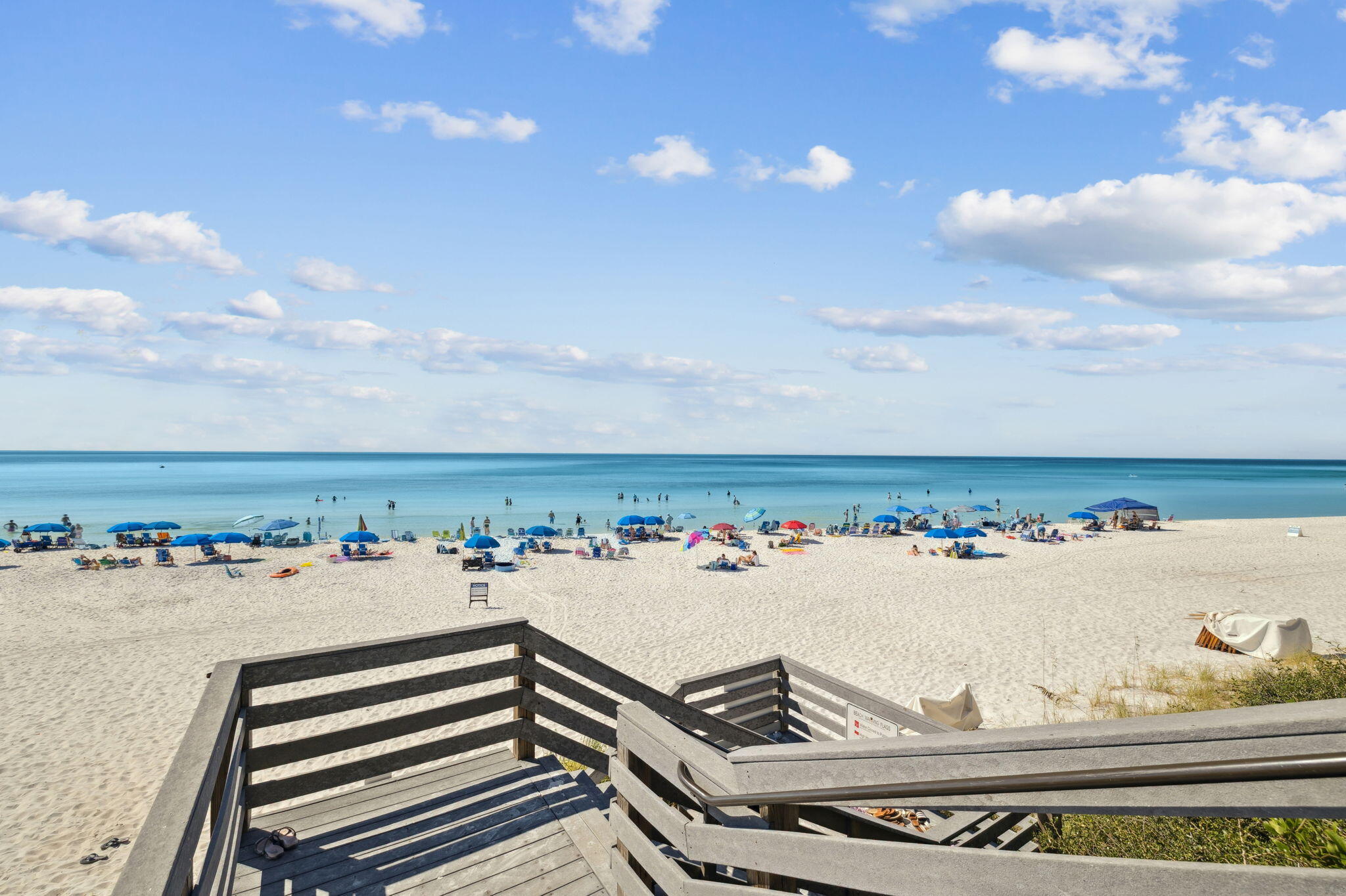 4100 East County Highway 30A, Unit 1606 Santa Rosa Beach, FL 32459 - Photo 29 of 34 a view of a terrace with a bench