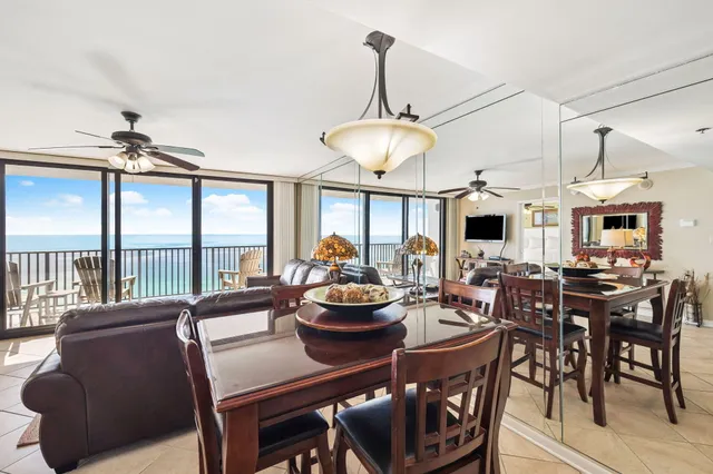 a view of a dining room with furniture window and outside view
