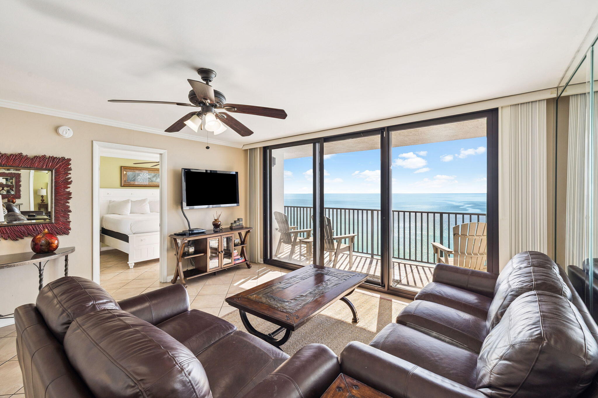 4100 East County Highway 30A, Unit 1606 Santa Rosa Beach, FL 32459 - Photo 9 of 34 a living room with furniture a flat screen tv and a large window