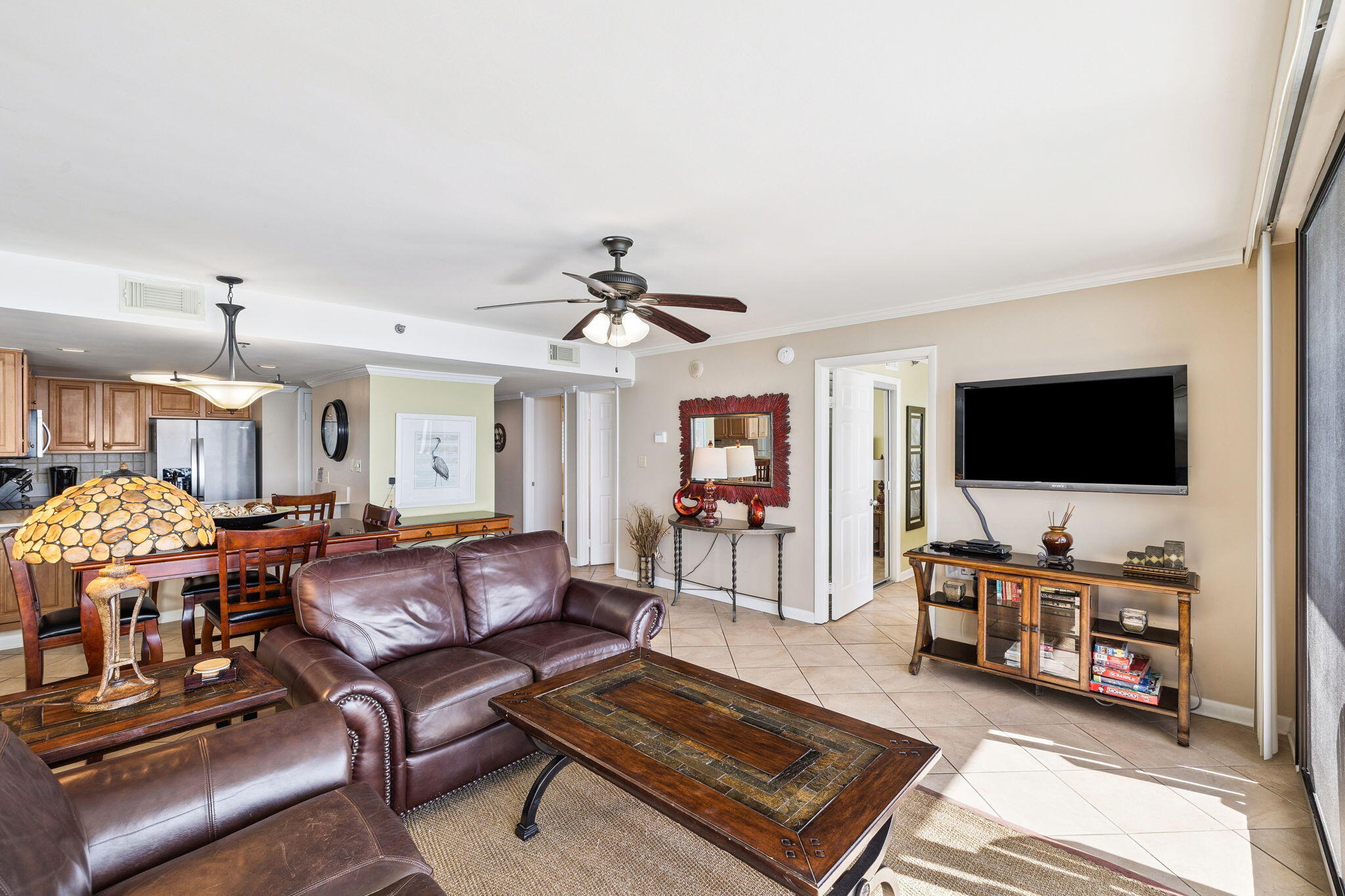 4100 East County Highway 30A, Unit 1606 Santa Rosa Beach, FL 32459 - Photo 10 of 34 a living room with furniture and a flat screen tv