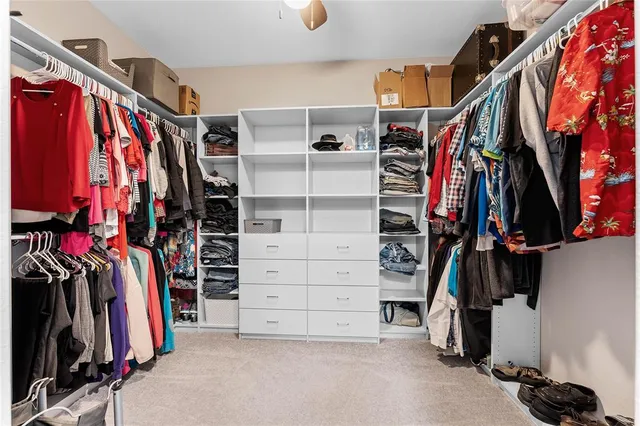 an aerial view of residential houses with city view
