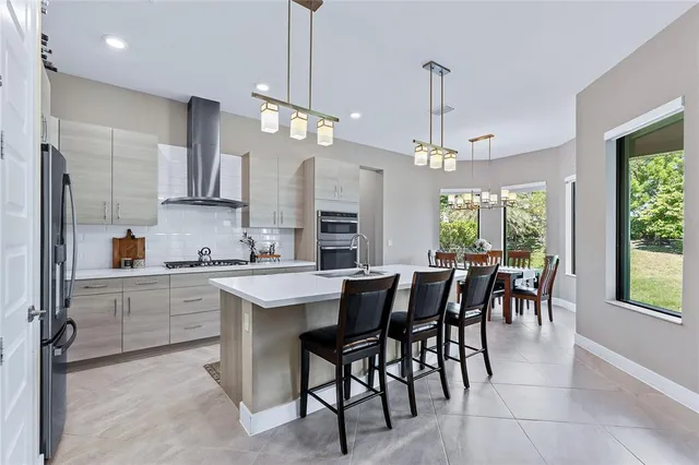 a bathroom with a double vanity sink mirror and double