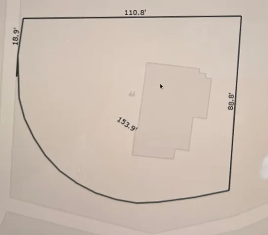 a close view of a closet with wooden floor