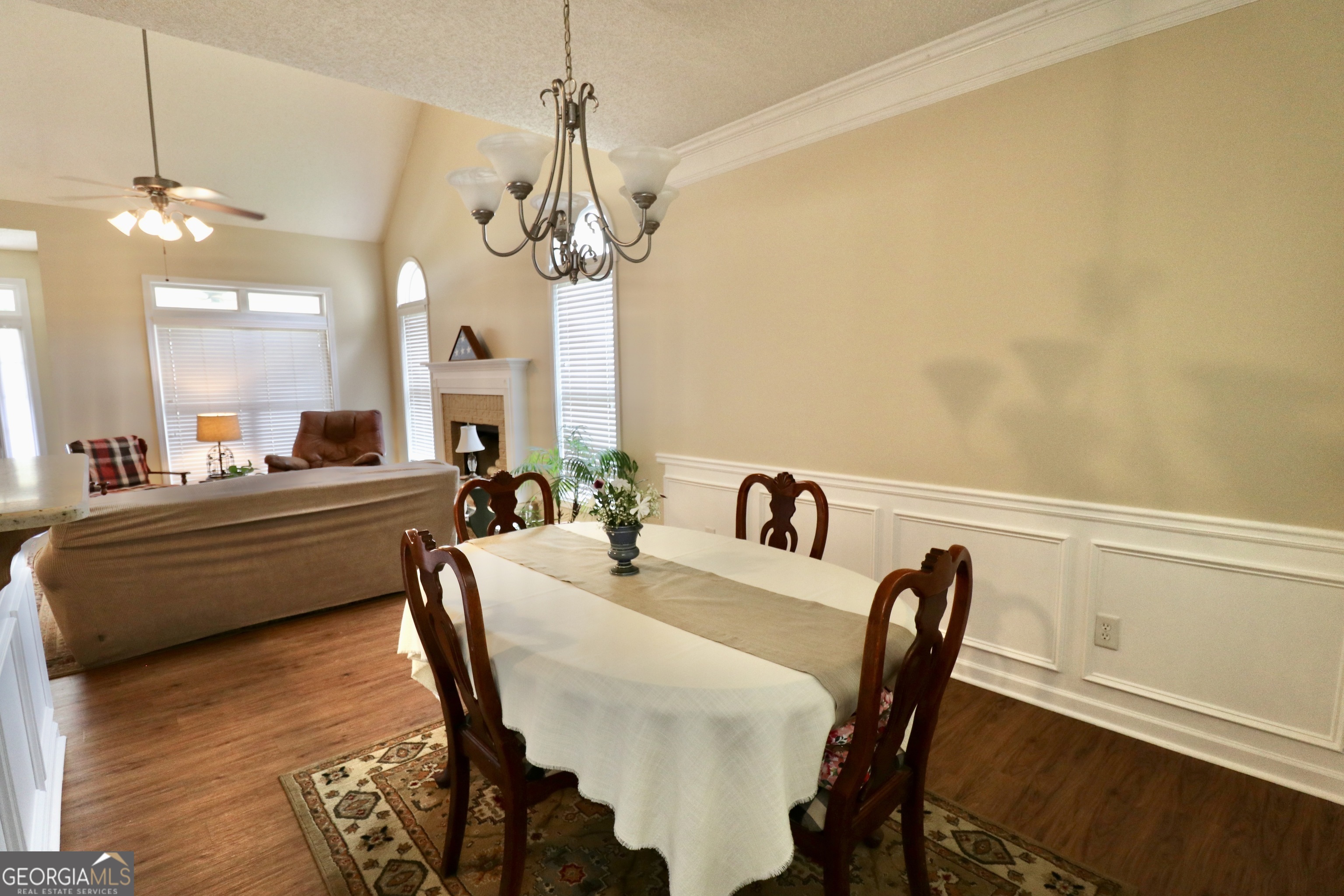 190 Roundtree Way Williamson, GA 30292 - Photo 18 of 73 a view of a dining room with furniture and a chandelier