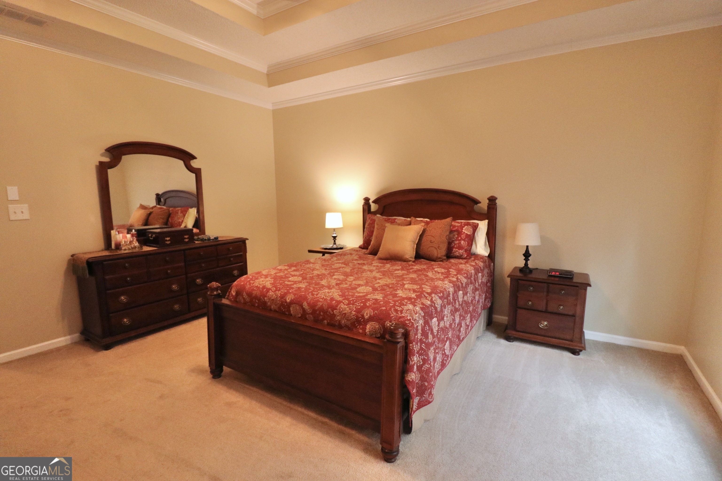 190 Roundtree Way Williamson, GA 30292 - Photo 34 of 73 a bedroom with a bed and a dresser