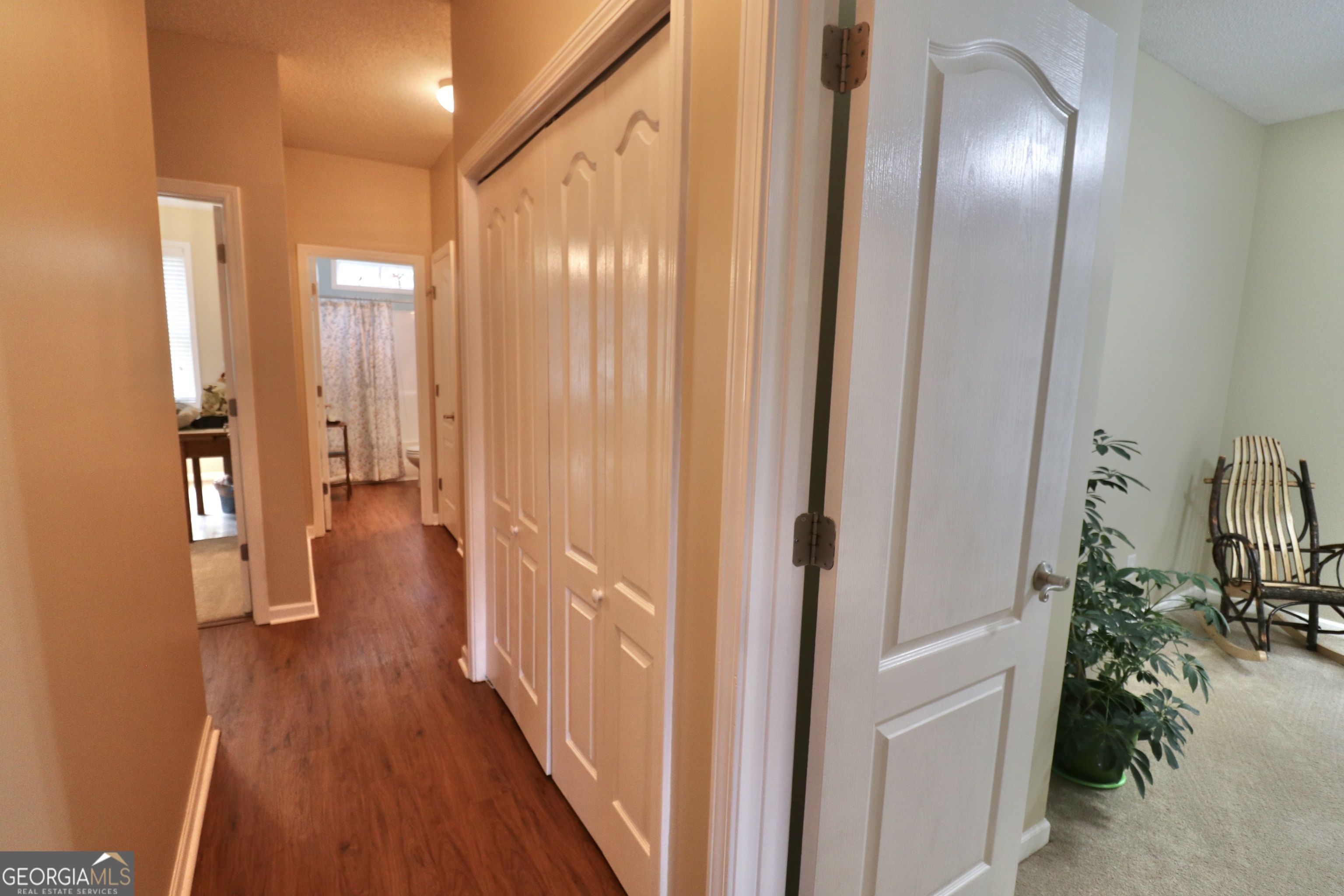 190 Roundtree Way Williamson, GA 30292 - Photo 41 of 73 a view of a hallway with wooden floor