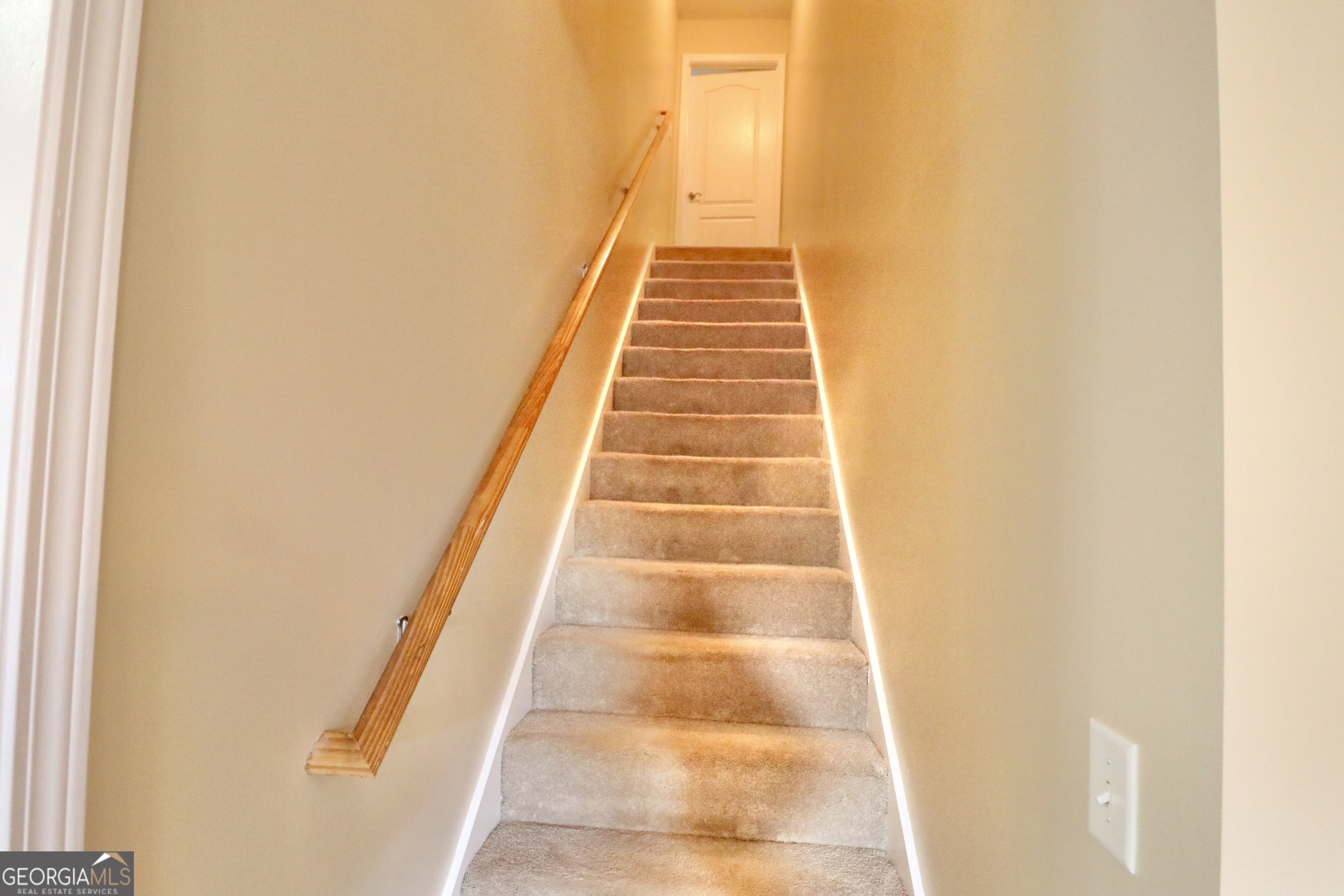 190 Roundtree Way Williamson, GA 30292 - Photo 49 of 73 a view of staircase with white walls