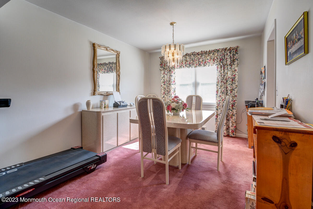 38 Ryan Boulevard Freehold, NJ 07728 - Photo 11 of 22 a dining room with furniture and window