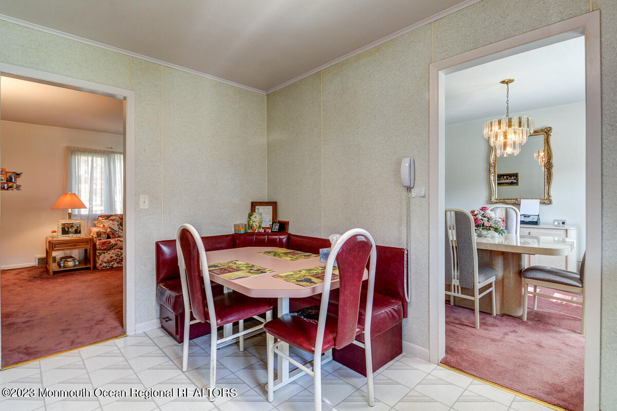 38 Ryan Boulevard Freehold, NJ 07728 - Photo 13 of 22 a view of a dining room with furniture