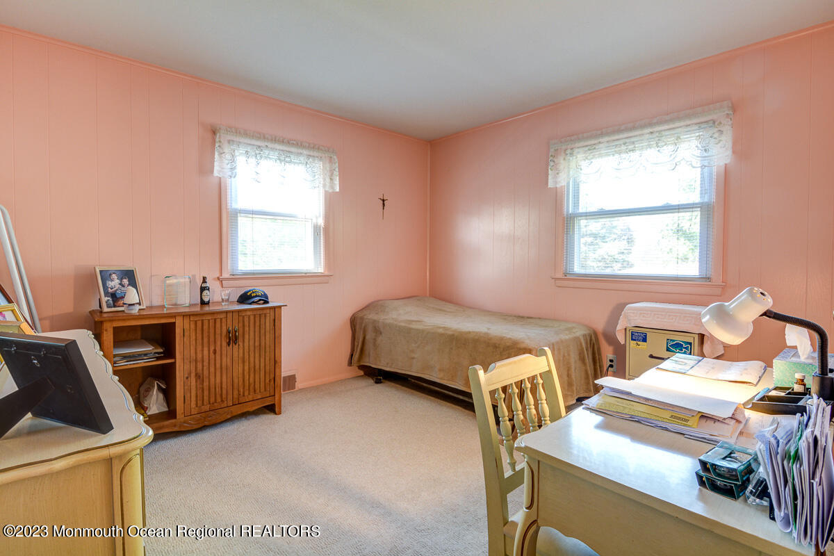 38 Ryan Boulevard Freehold, NJ 07728 - Photo 18 of 22 a bedroom with 2 bed and a dresser
