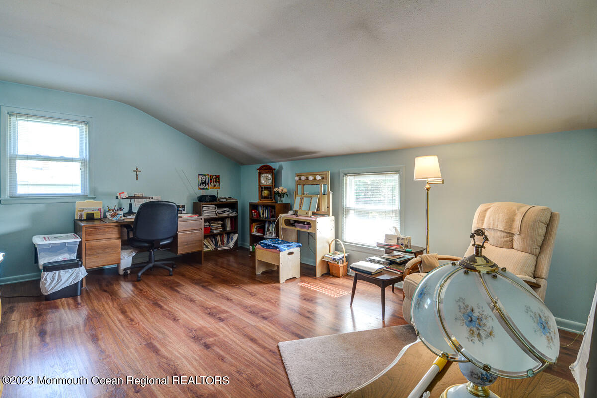 38 Ryan Boulevard Freehold, NJ 07728 - Photo 20 of 22 a living room with furniture or couch and a wooden floor