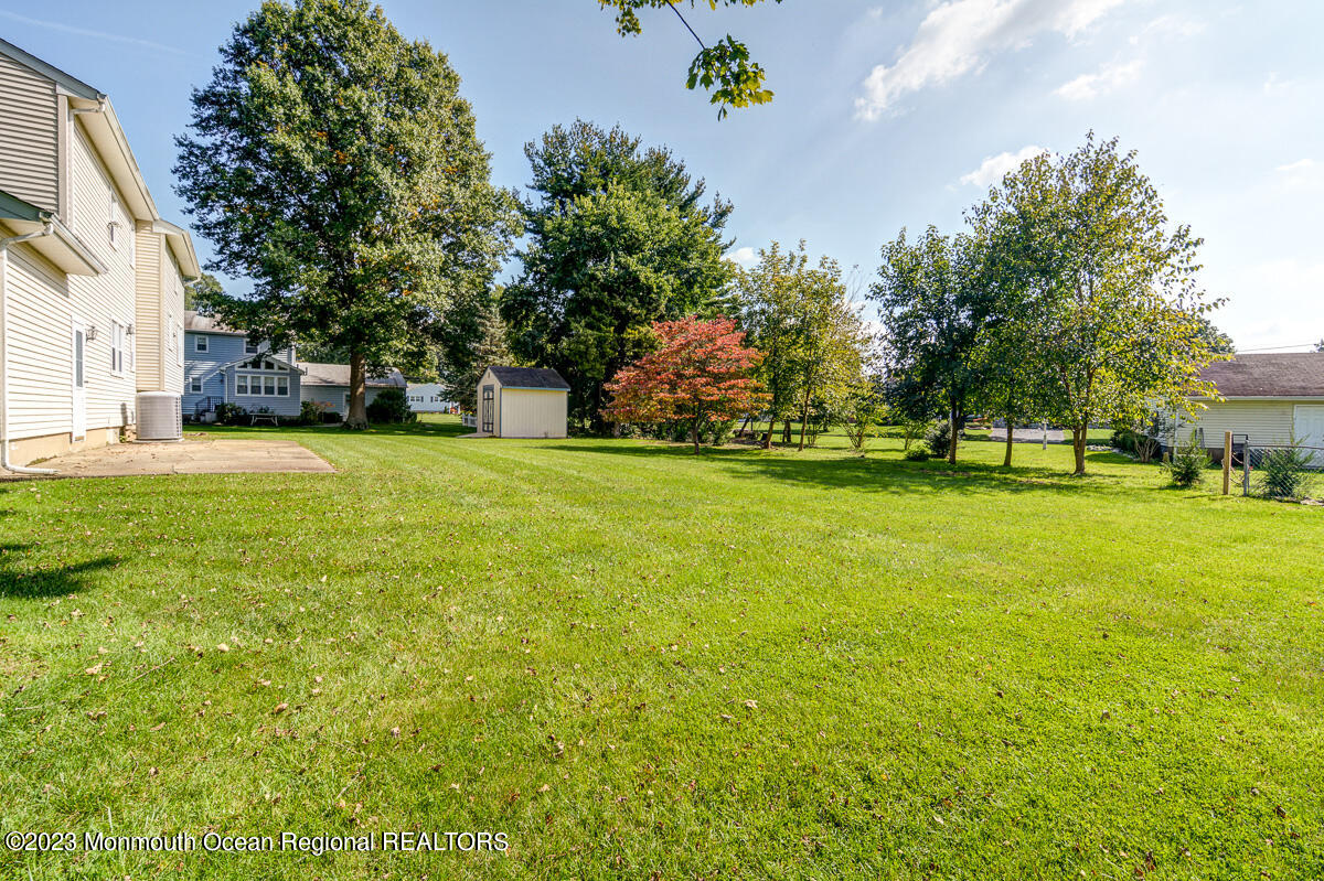 38 Ryan Boulevard Freehold, NJ 07728 - Photo 3 of 22 a view of a field of grass and trees
