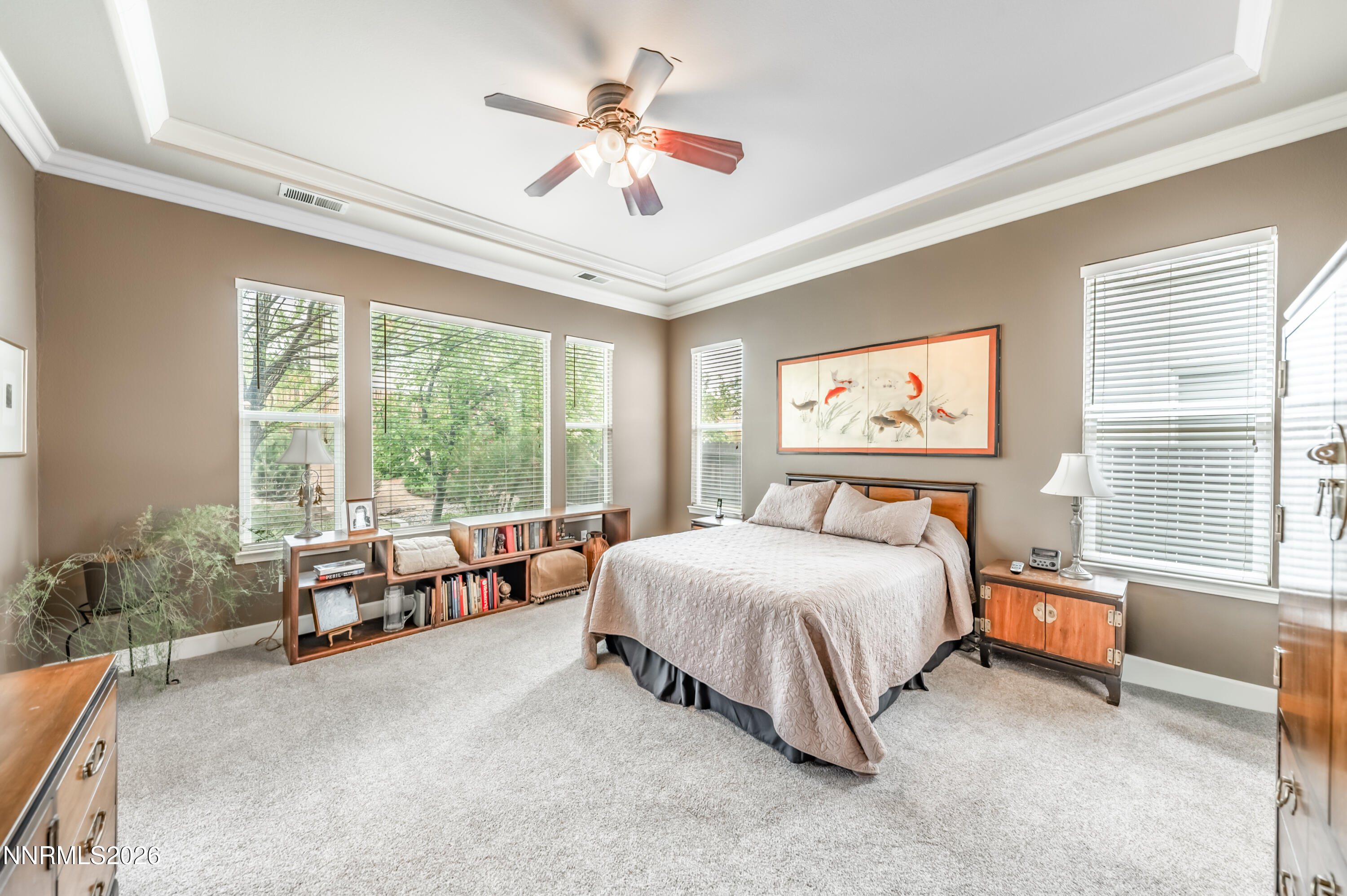 5865 Slate Drive Reno, NV 89523 - Photo 11 of 23 a bedroom with a bed couch and window