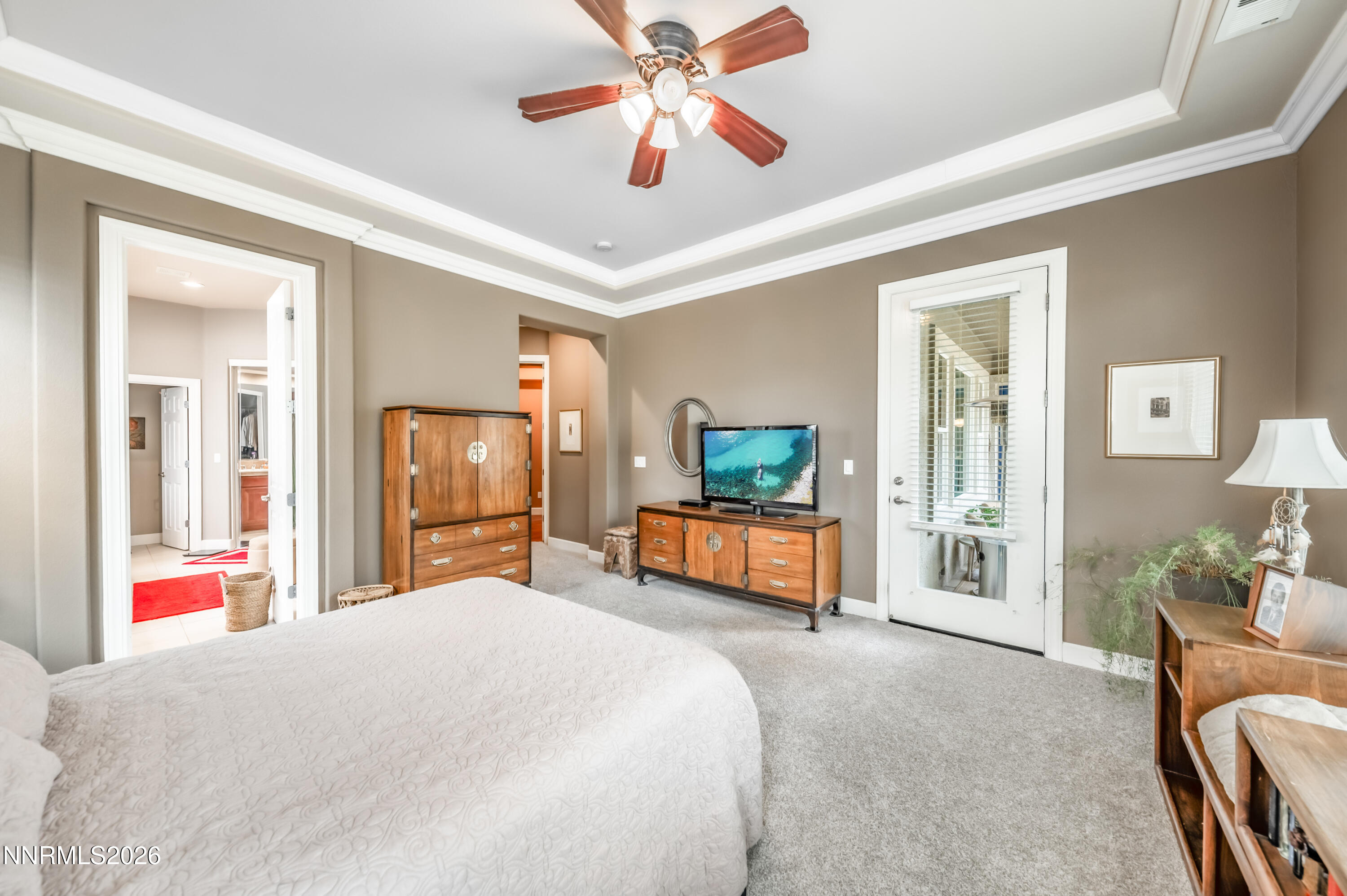 5865 Slate Drive Reno, NV 89523 - Photo 12 of 23 a bedroom with a bed and ceiling fan