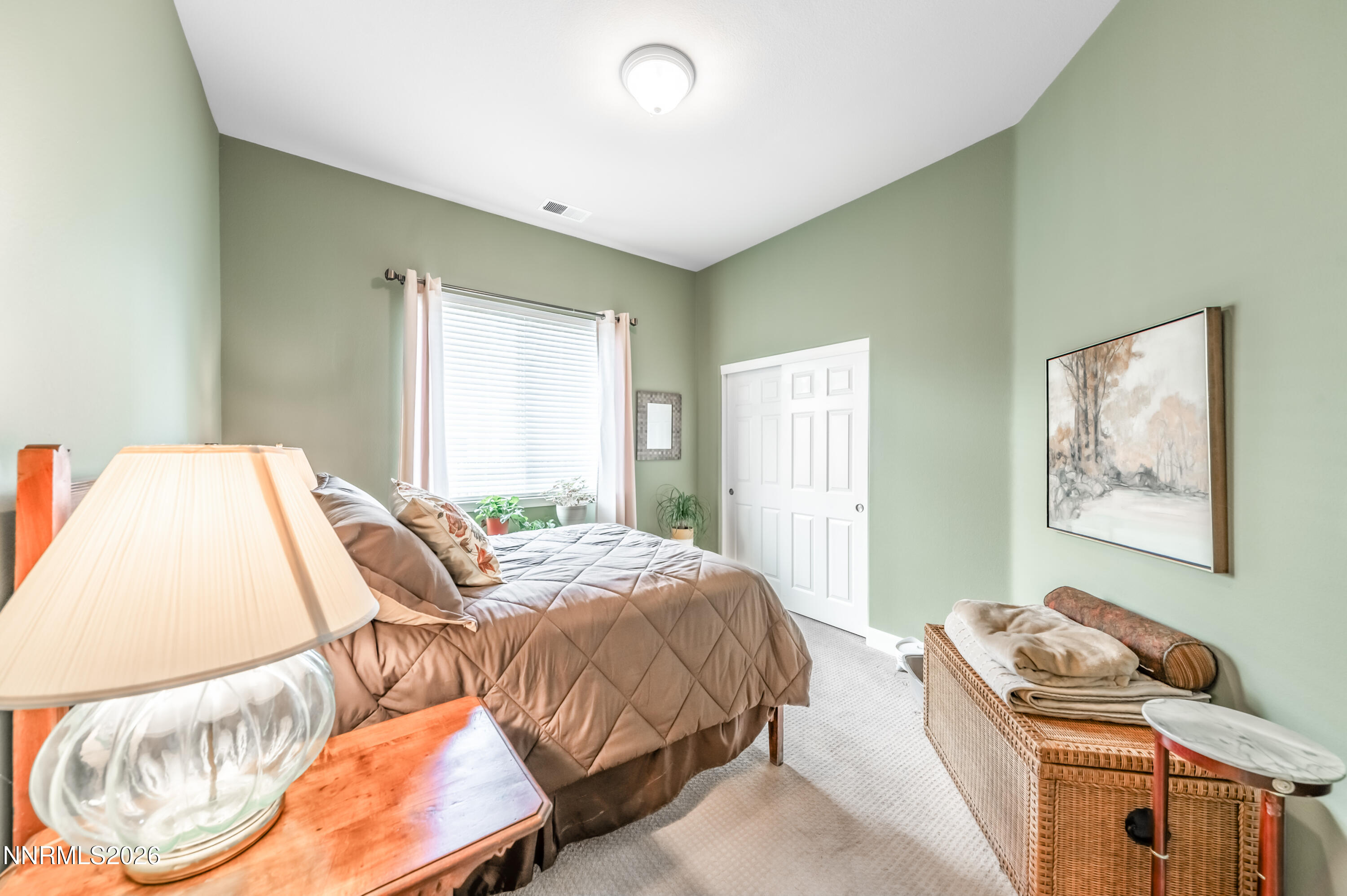 5865 Slate Drive Reno, NV 89523 - Photo 14 of 23 a bedroom with bed and a window