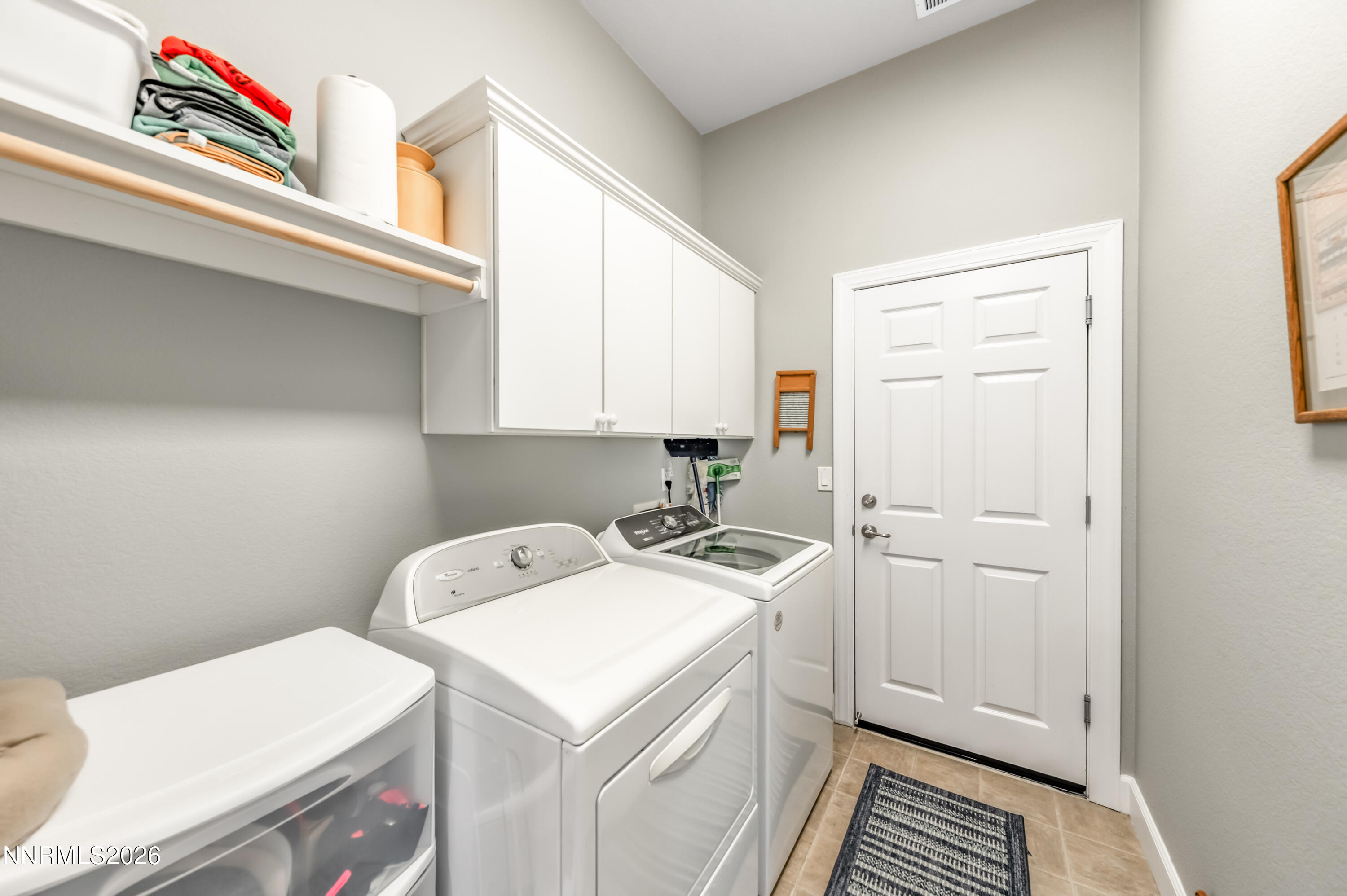 5865 Slate Drive Reno, NV 89523 - Photo 19 of 23 a bathroom with a sink a toilet and vanity