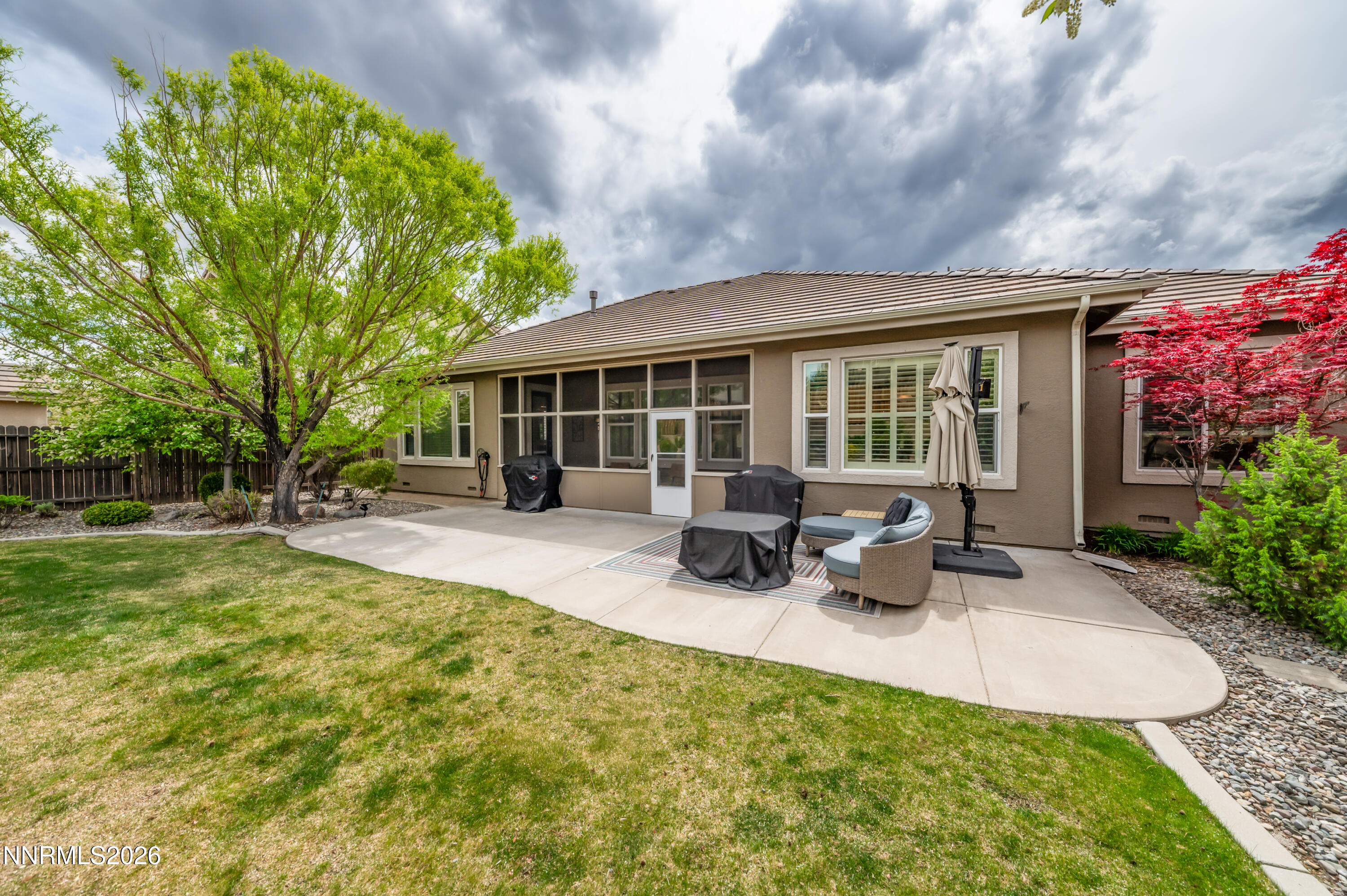 5865 Slate Drive Reno, NV 89523 - Photo 23 of 23 a view of a house with swimming pool and sitting area