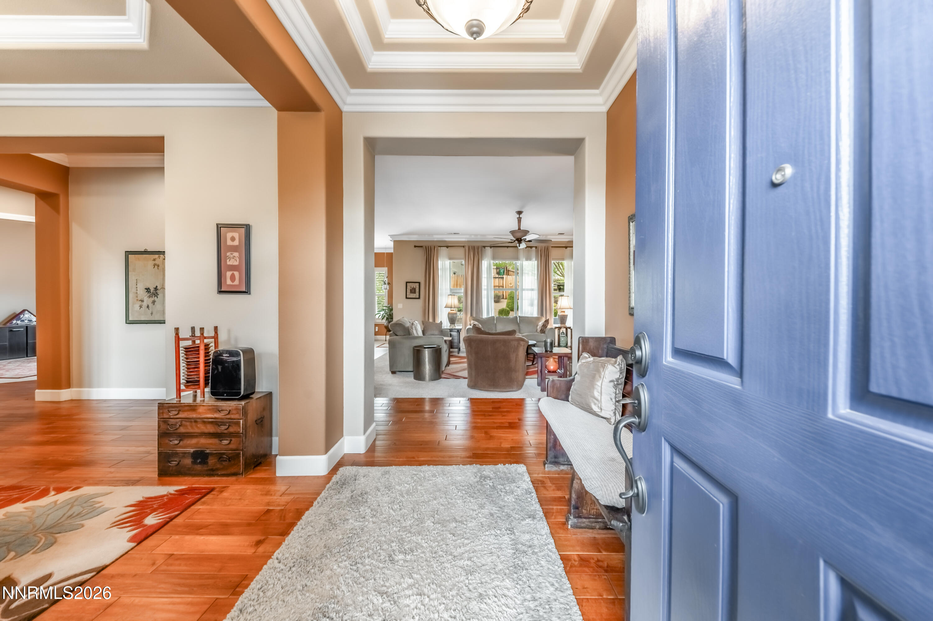 5865 Slate Drive Reno, NV 89523 - Photo 3 of 23 a living room with furniture and a wooden floor