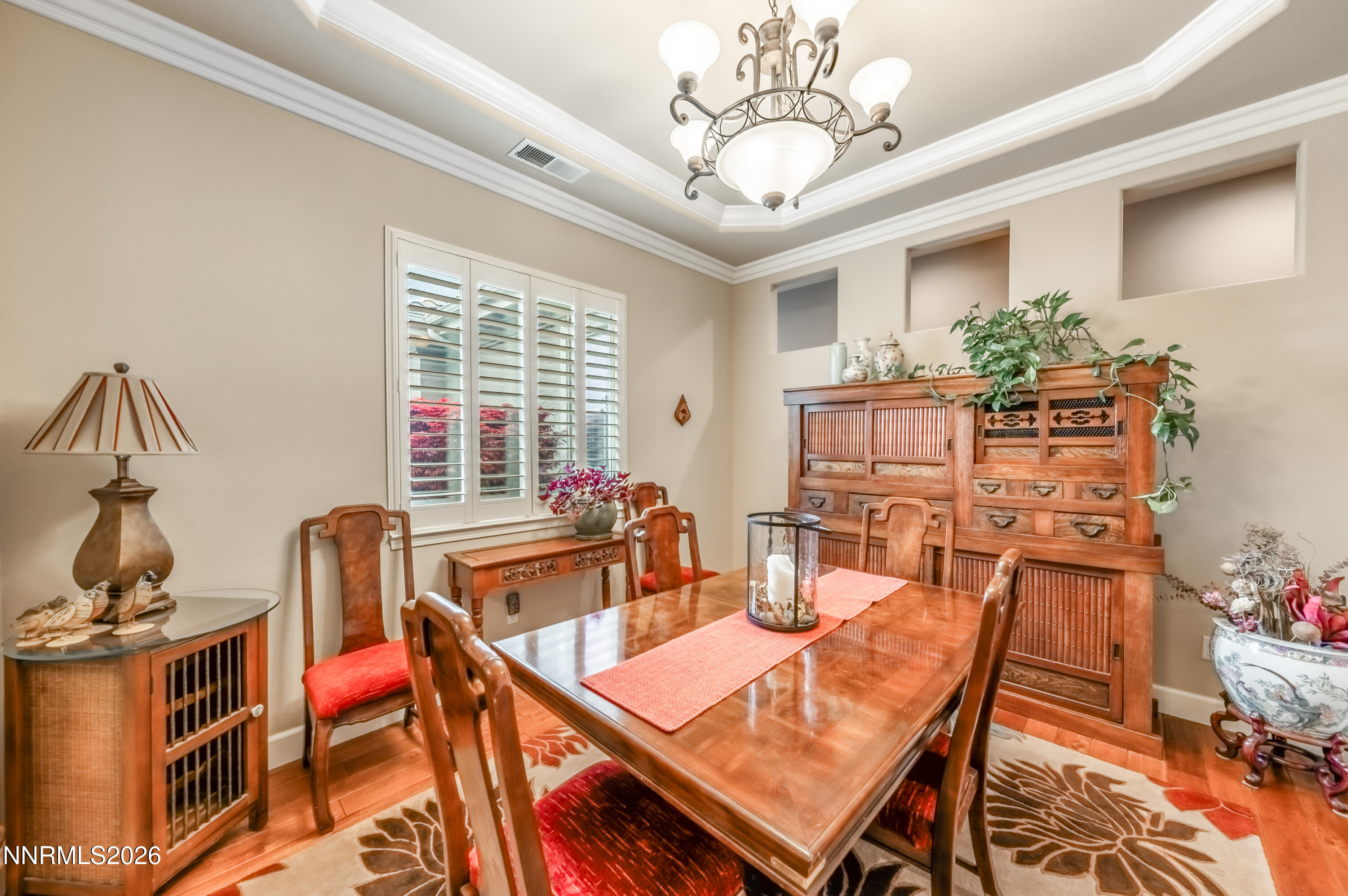 5865 Slate Drive Reno, NV 89523 - Photo 5 of 23 a dining room with furniture a chandelier and window