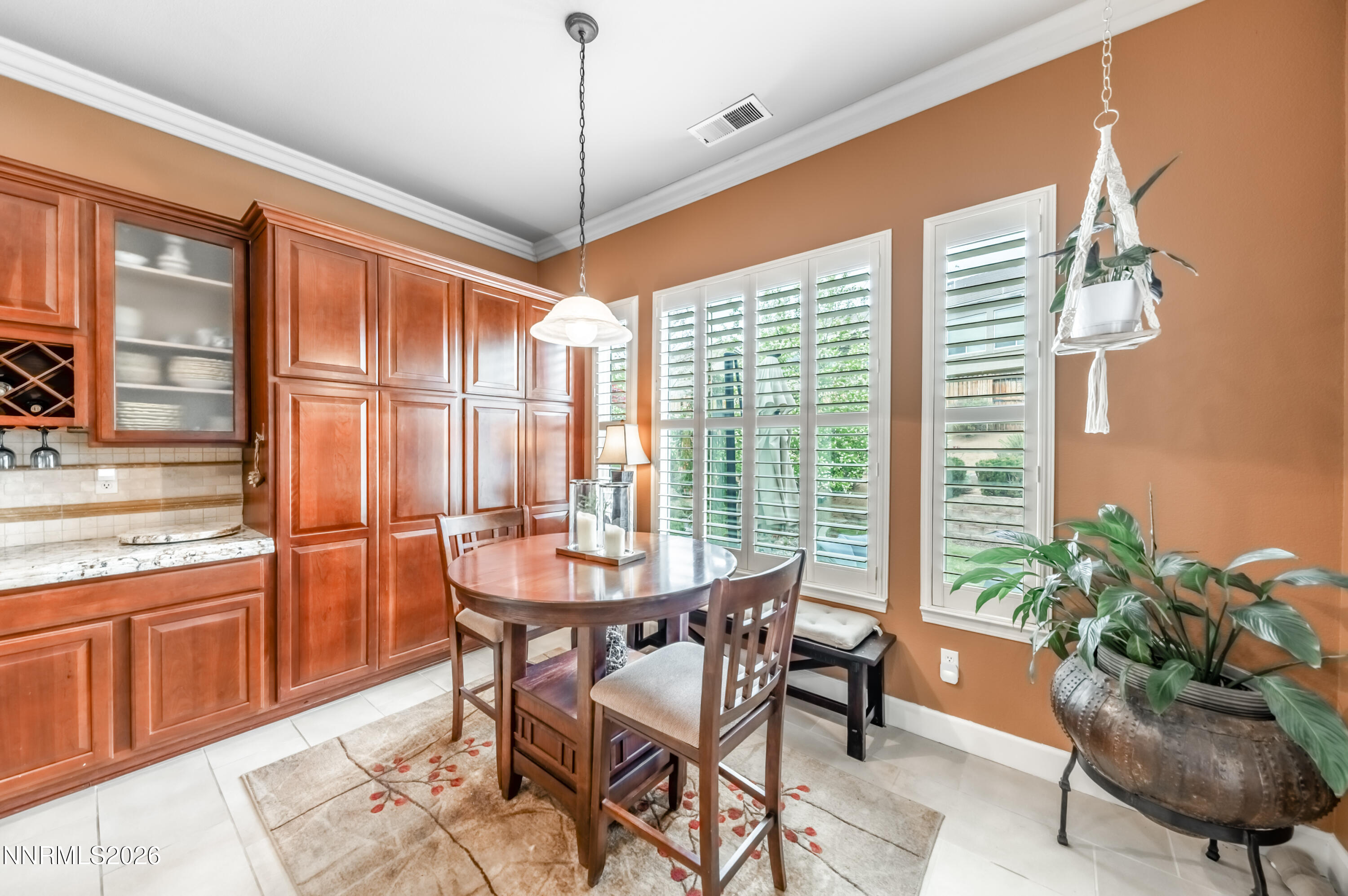 5865 Slate Drive Reno, NV 89523 - Photo 9 of 23 a dining room with furniture and window