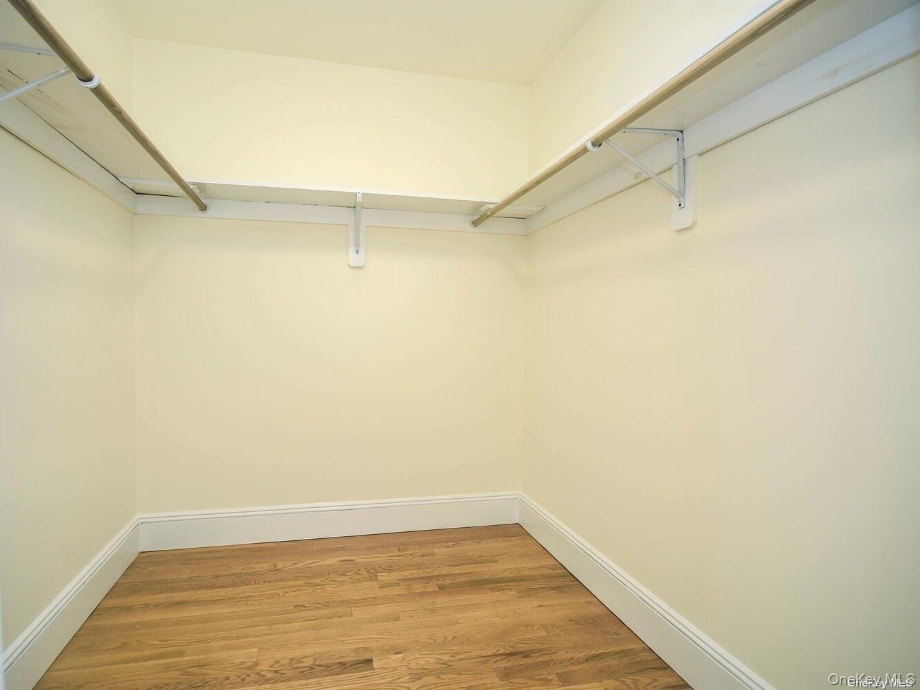 51 Inwood Road, Unit B Port Washington, NY 11050 - Photo 28 of 33 a view of a room with racks on the wall