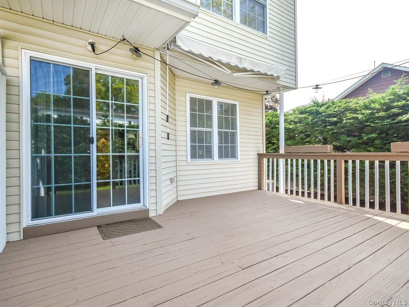 51 Inwood Road, Unit B Port Washington, NY 11050 - Photo 29 of 33 a view of a house with a large window