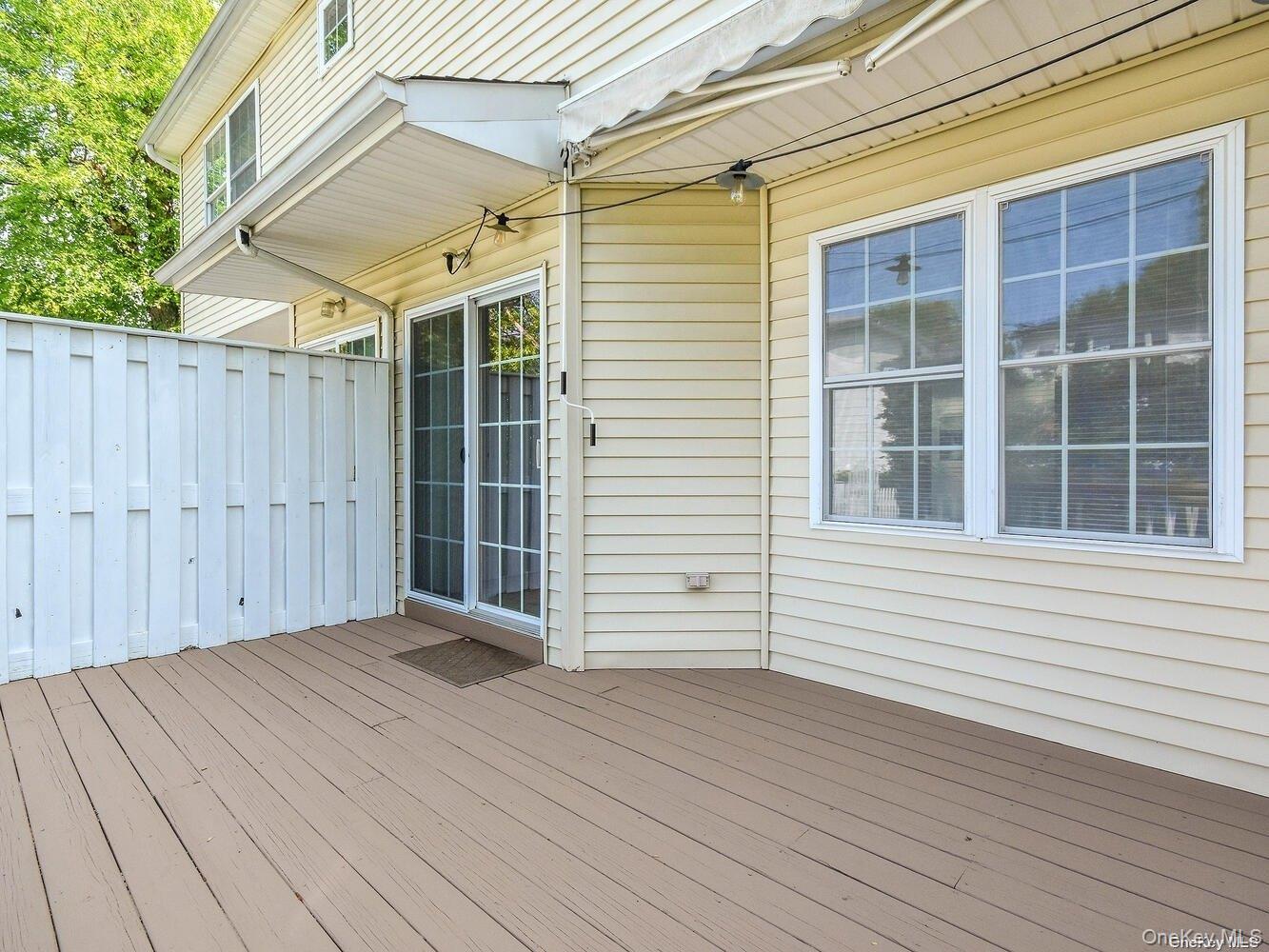 51 Inwood Road, Unit B Port Washington, NY 11050 - Photo 30 of 33 a view of a backyard of a house