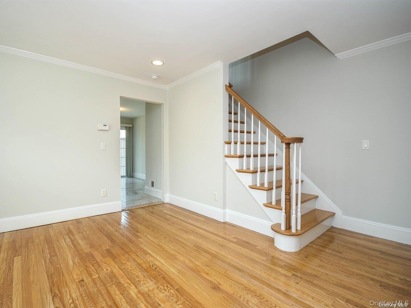 51 Inwood Road, Unit B Port Washington, NY 11050 - Photo 7 of 33 a view of an entryway with wooden floor