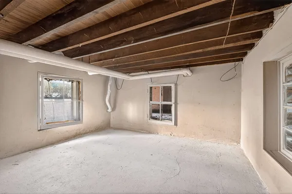 a view of road with large trees