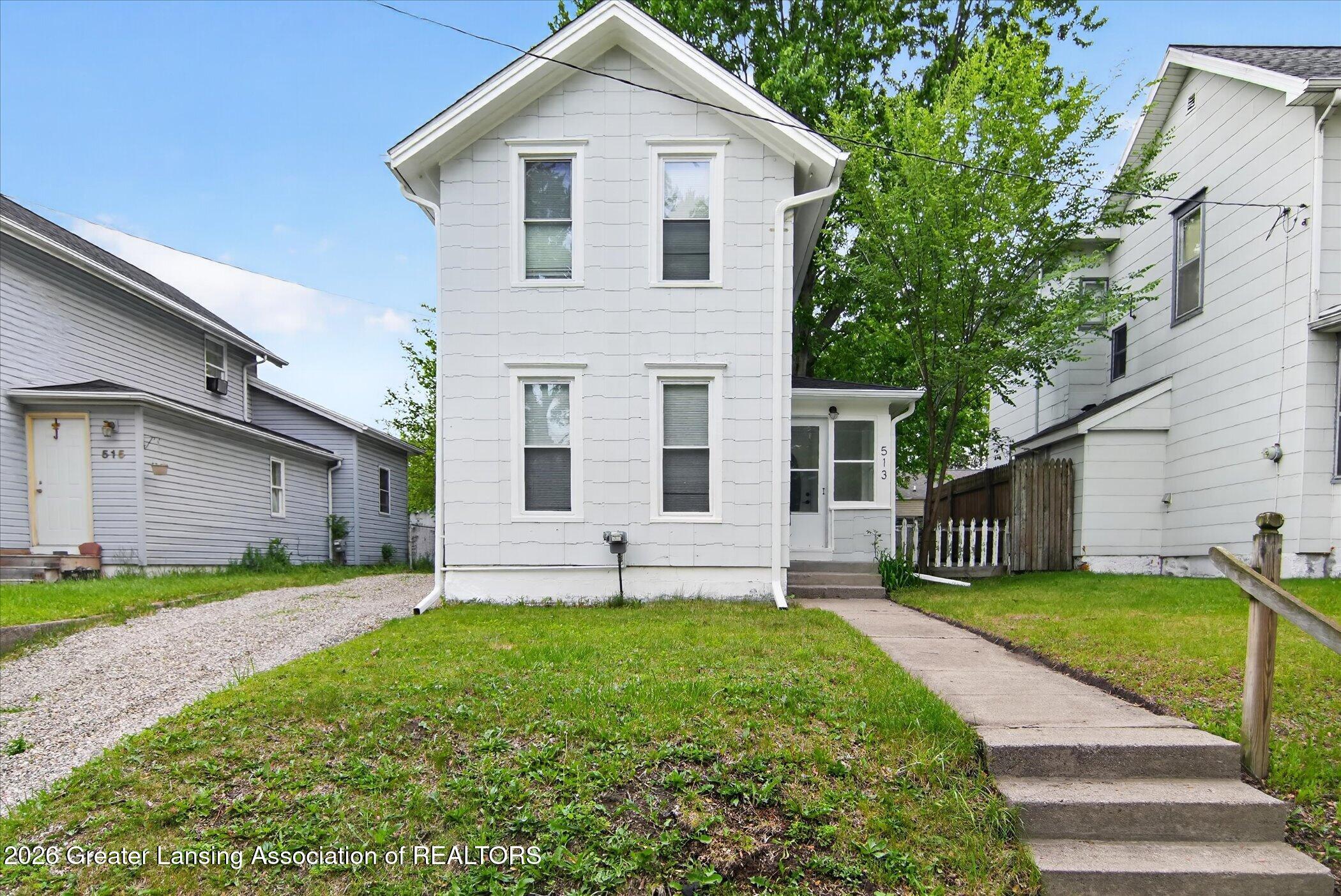 513 North Waterloo Avenue Jackson, MI 49201 - Photo 3 of 40 04-513-N-Waterloo-Ave-WindowStill