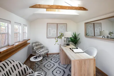 a room with furniture and window