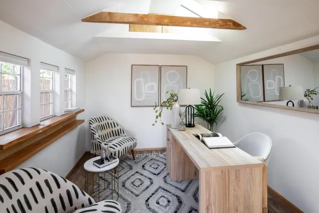 a room with furniture and window