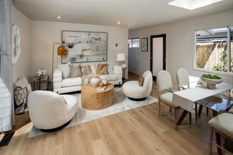 a living room with furniture and a couch