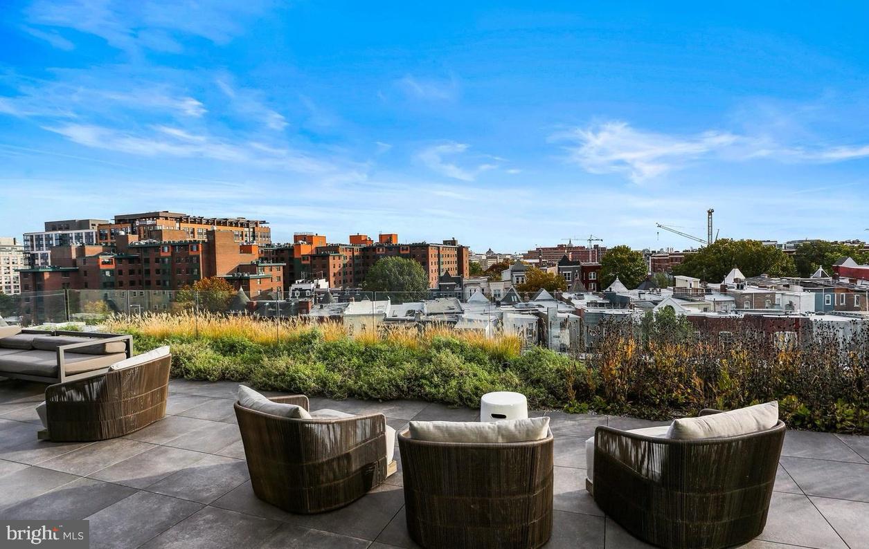 57 N Street Northwest, Unit 302 Washington, DC 20001 - Photo 29 of 34 a view of a lake with couches chairs