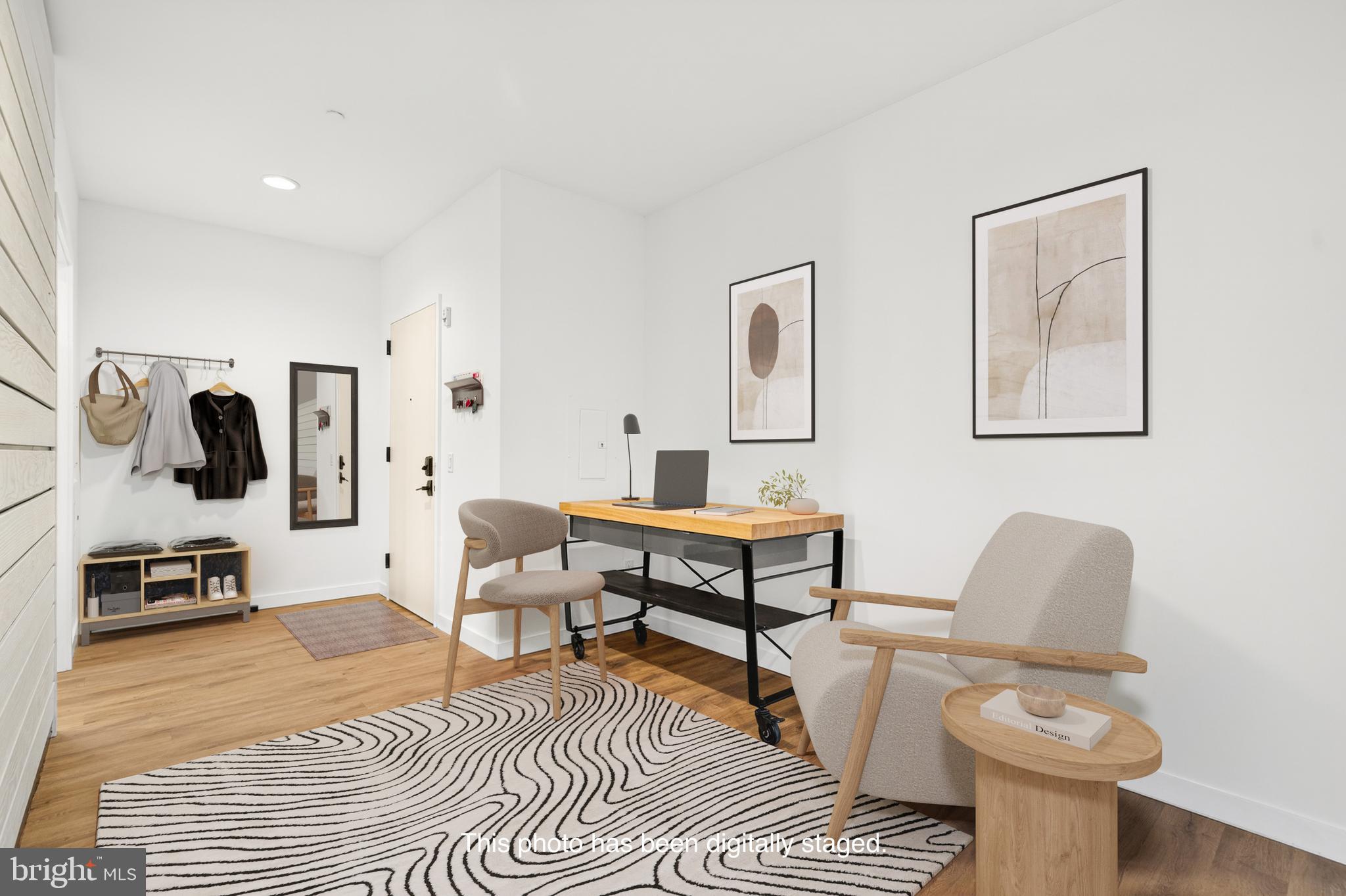 57 N Street Northwest, Unit 302 Washington, DC 20001 - Photo 6 of 34 a living room with furniture and a rug