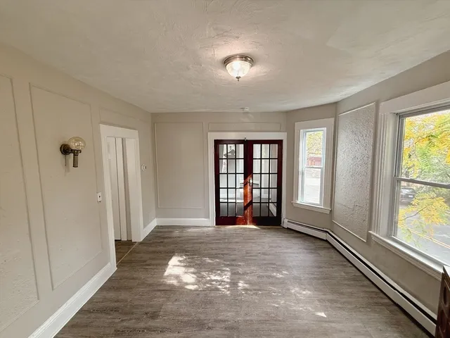 a view of an empty room with a window