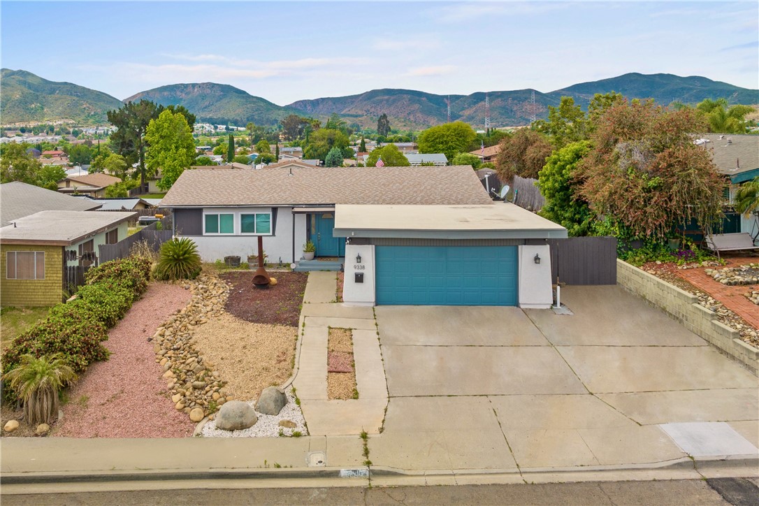 9338 Heiting Court Santee, CA 92071 - Photo 1 of 1 a aerial view of a house with a yard