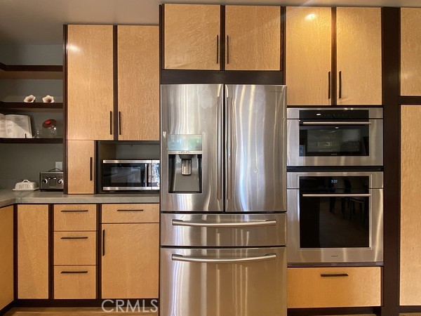 3402 Buttermilk Lane Arcata, CA 95521 - Photo 14 of 48 a kitchen with stainless steel appliances a refrigerator sink and microwave