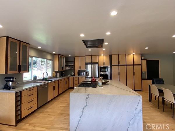 3402 Buttermilk Lane Arcata, CA 95521 - Photo 17 of 48 a large kitchen with stainless steel appliances lots of counter space and a sink
