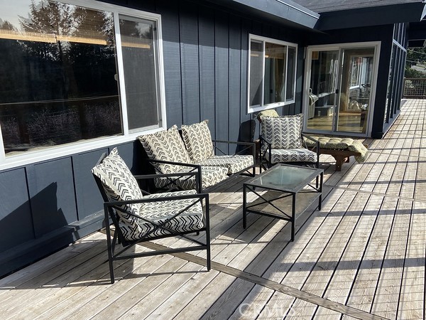 3402 Buttermilk Lane Arcata, CA 95521 - Photo 21 of 48 a view of a roof deck with chair and table