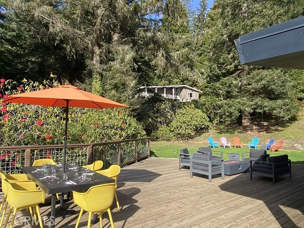 3402 Buttermilk Lane Arcata, CA 95521 - Photo 23 of 48 an outdoor space with furniture and umbrella
