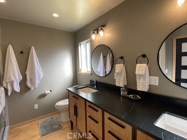 3402 Buttermilk Lane Arcata, CA 95521 - Photo 28 of 48 a bathroom with a sink and a mirror