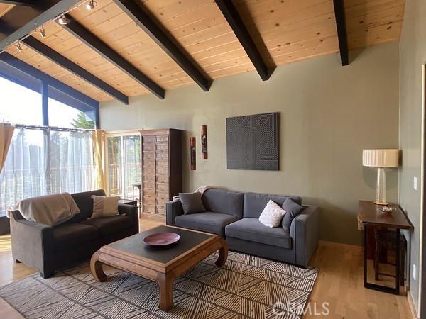 3402 Buttermilk Lane Arcata, CA 95521 - Photo 3 of 48 a living room with furniture and a table